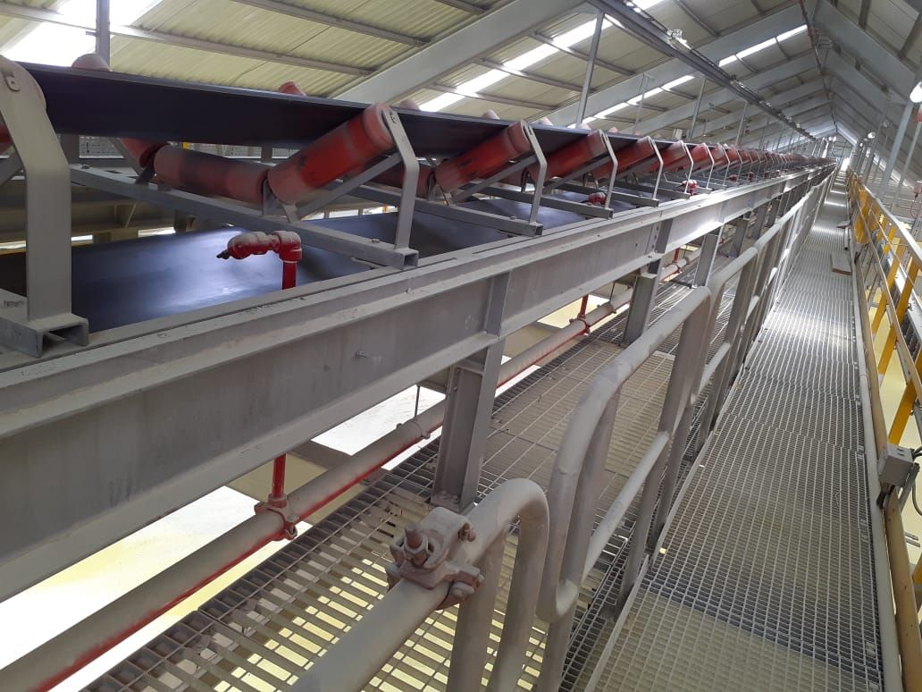 Conveyor belt walkway and idlers