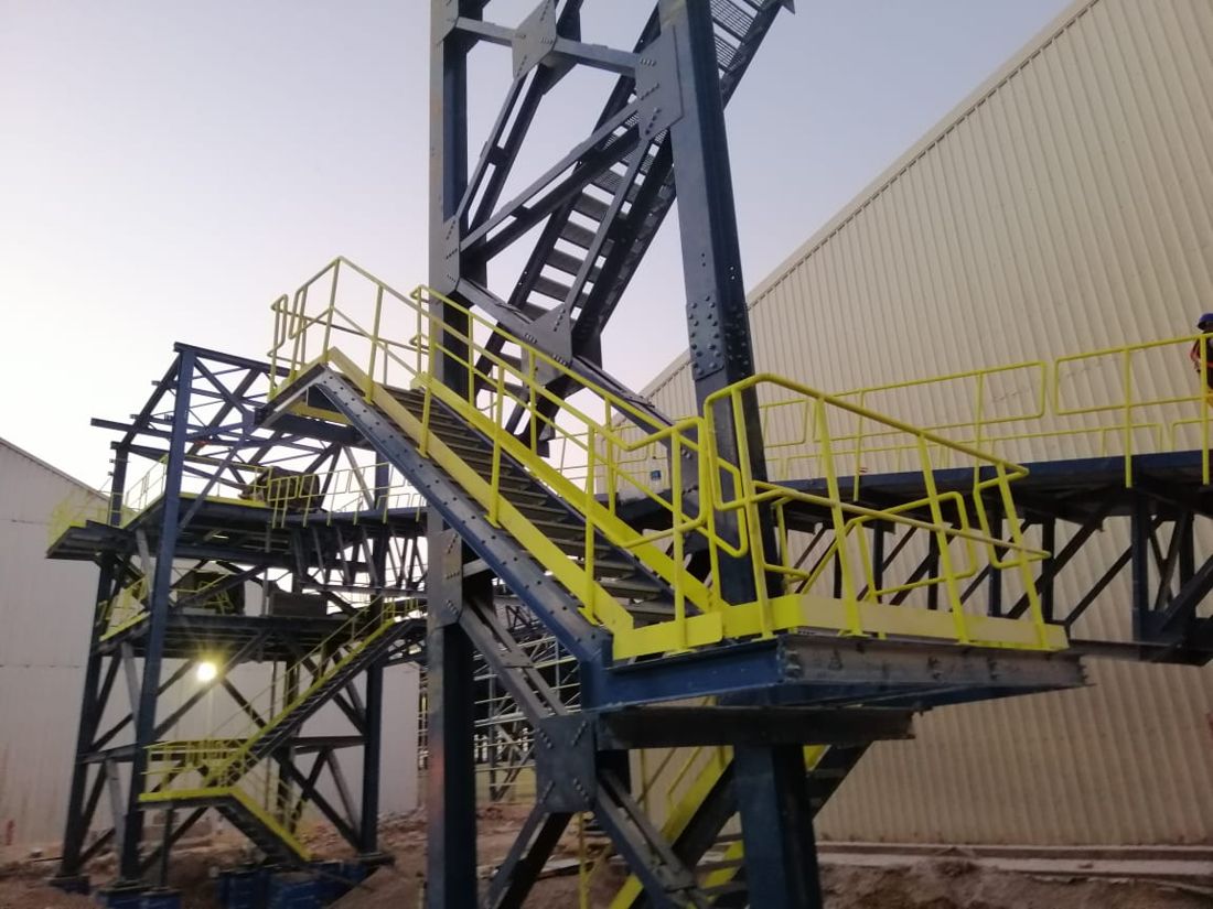 Conveyor transfer tower stairs and platforms